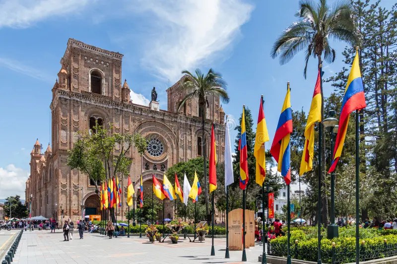 Parque Calderón and the New Cathedral of Cuenca with Ecuadorian flags